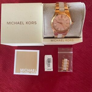 Michael Kors Woman’s wrist watch.